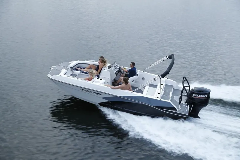 Slide: The Image of 2023 Starcraft 211 SVX boat cruising on water with passengers enjoying the ride. - 3