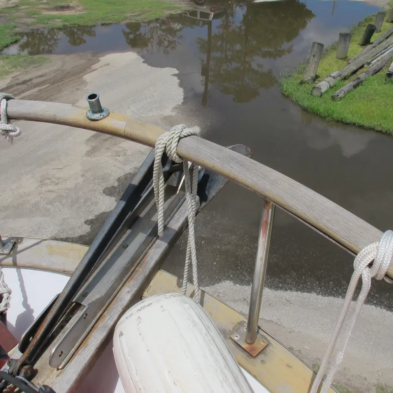 Slide: The Image of Bow of 1981 Albin 36 boat with ropes and water reflection. - 11