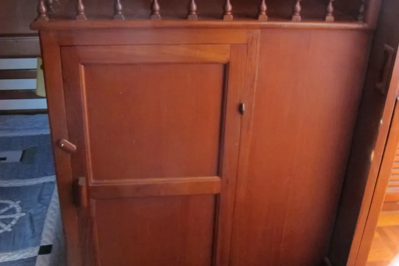 Slide: The Image of Wooden interior cabinet on 1981 Albin 36 boat, featuring classic design and craftsmanship. - 33