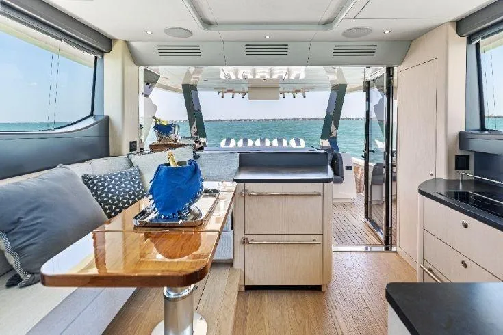 Slide: The Image of Luxurious interior of 2026 Scout 670 LXS yacht with ocean view and modern amenities. - 35