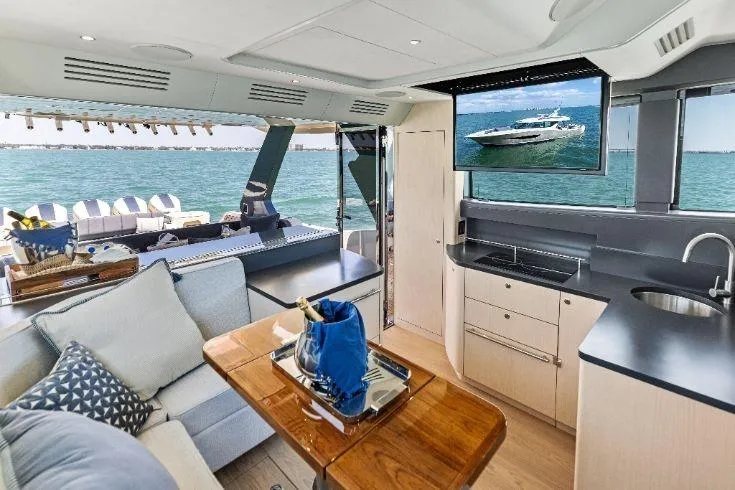 Slide: The Image of Luxurious interior of 2026 Scout 670 LXS yacht with ocean view and modern amenities. - 36