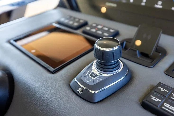 Slide: The Image of Control panel of 2026 Scout 670 LXS boat with joystick and touchscreen. - 42