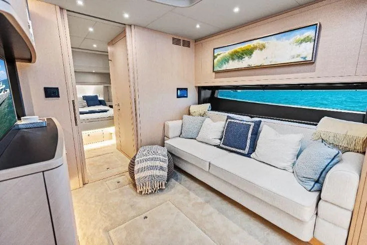 Slide: The Image of Luxurious interior of 2026 Scout 670 LXS yacht with elegant seating and ocean view. - 46