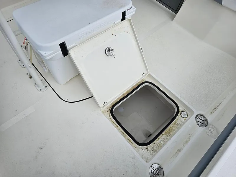 Slide: The Image of Open storage compartment on Avenger AV26 boat, 2025 model. - 15