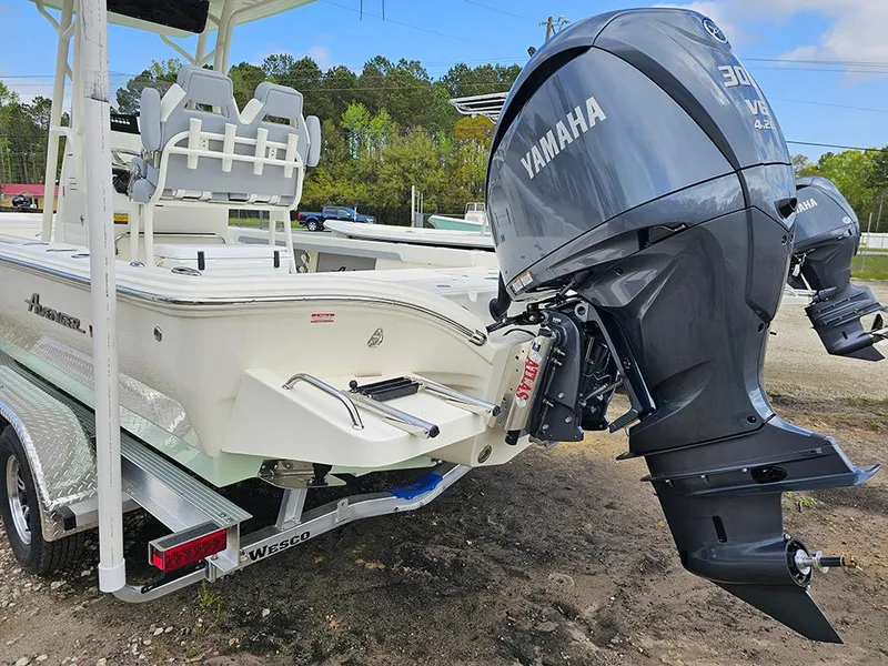 Slide: The Image of 2025 Avenger AV26 boat with Yamaha outboard motor on a Wesco trailer. - 8
