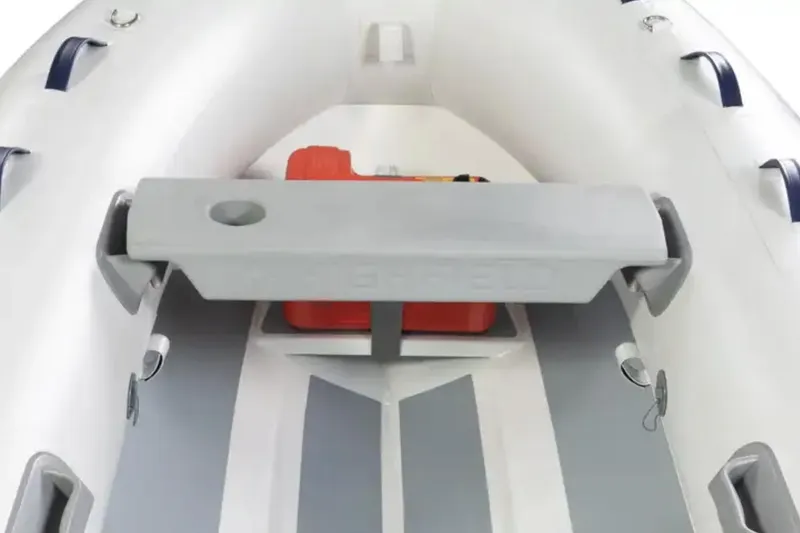 Slide: The Image of 2024 Highfield UltraLite 290LT inflatable boat interior with orange fuel tank. - 5