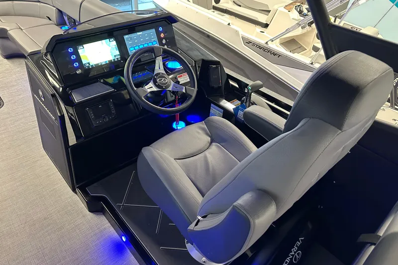 Slide: The Image of Captain's seat and control panel of 2025 Veranda VX 27 DCRC boat. - 4