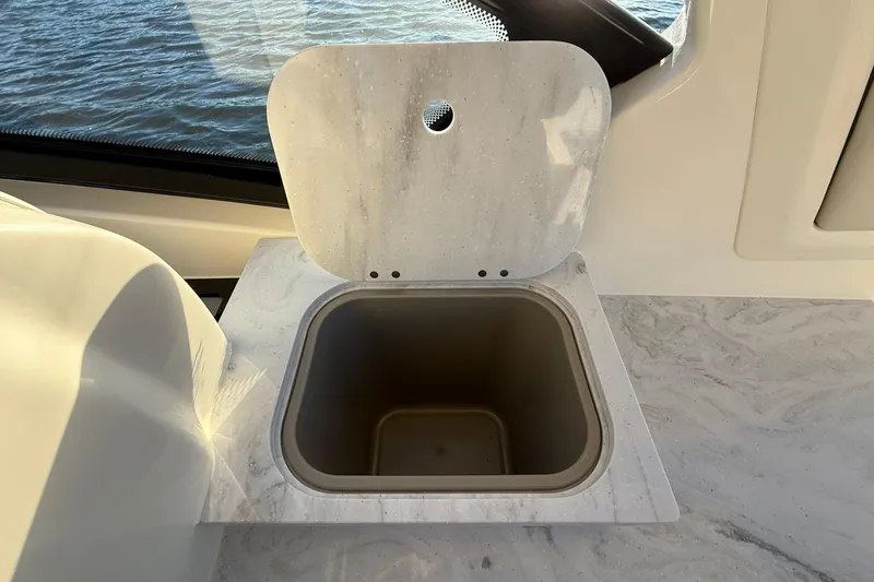 Slide: The Image of Marble countertop with open sink on 2026 Scout 277 Dorado boat. - 23