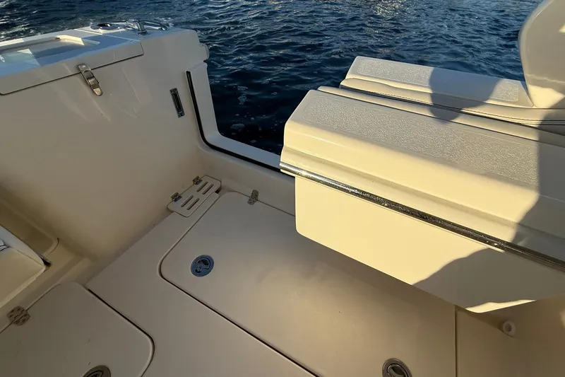 Slide: The Image of 2026 Scout 277 Dorado boat interior with seating and water view. - 30