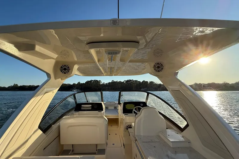 Slide: The Image of 2026 Scout 277 Dorado boat interior with sunlit water view. - 31