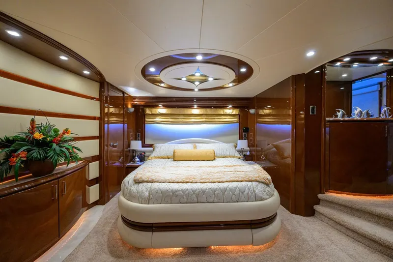Slide: The Image of Luxurious bedroom interior of 2005 Marquis 65 MY yacht with elegant wood finishes. - 17