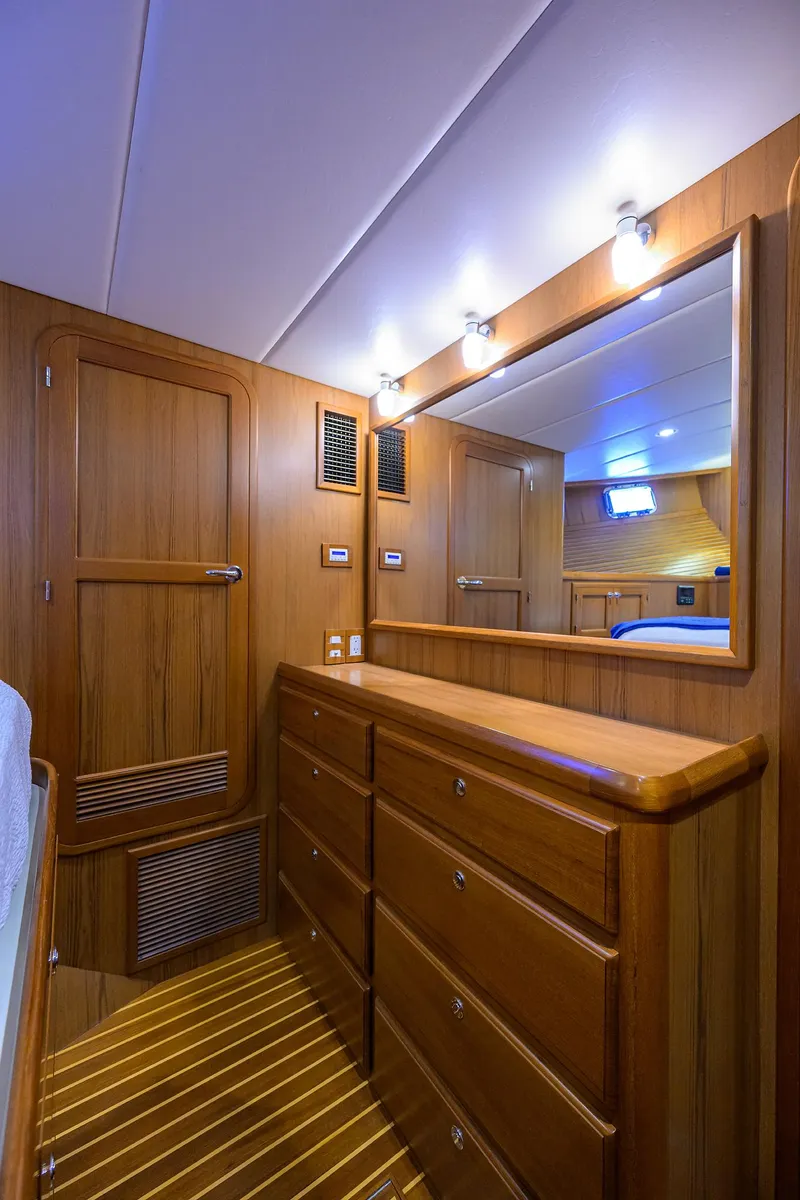 Slide: The Image of Large closet and bureau with lighted mirror - 21