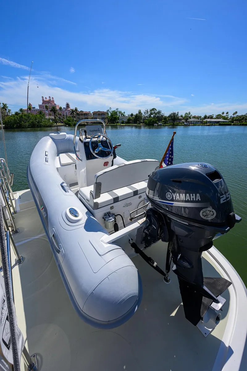 Slide: The Image of 2013 Krogen 44' AE Widebody with Yamaha motor, docked on a sunny day. - 35