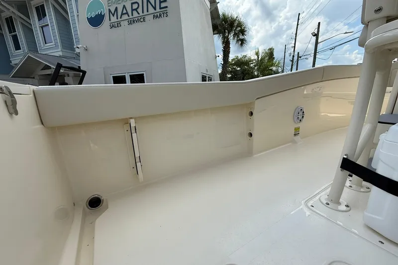 Slide: The Image of 2026 Scout 240 XSF boat interior at Emerald Marine dealership, showcasing sleek design and spacious layout. - 25