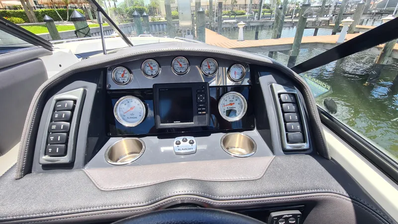 Slide: The Image of Dashboard of a 2018 Formula 270 Bowrider boat with gauges and controls. - 10
