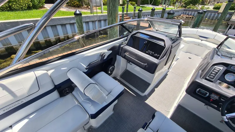 Slide: The Image of 2018 Formula 270 Bowrider interior with sleek seating and modern dashboard design. - 12