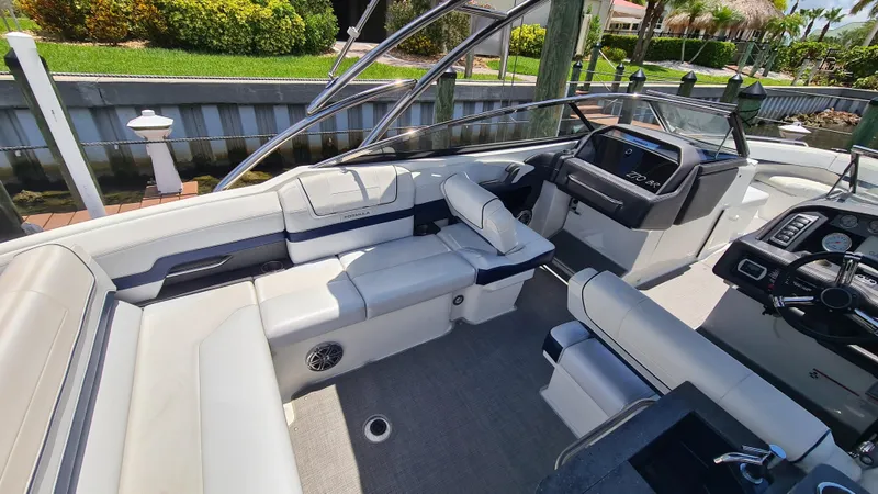 Slide: The Image of 2018 Formula 270 Bowrider interior with plush seating and modern dashboard. - 15