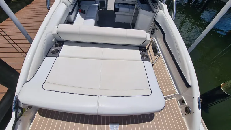 Slide: The Image of 2018 Formula 270 Bowrider boat interior with spacious seating and cup holders. - 22