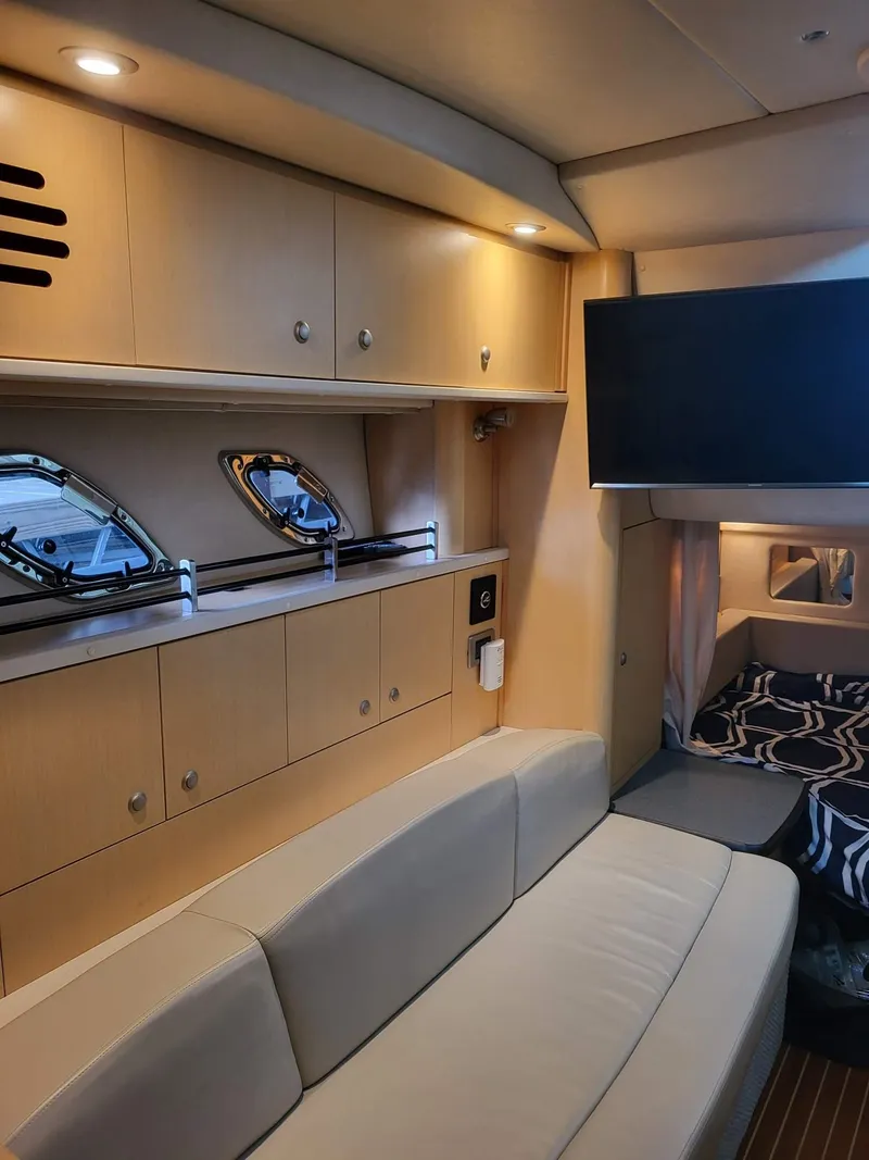 Slide: The Image of Luxurious interior of 2009 Sea Ray 310 Sundancer yacht with modern amenities. - 10