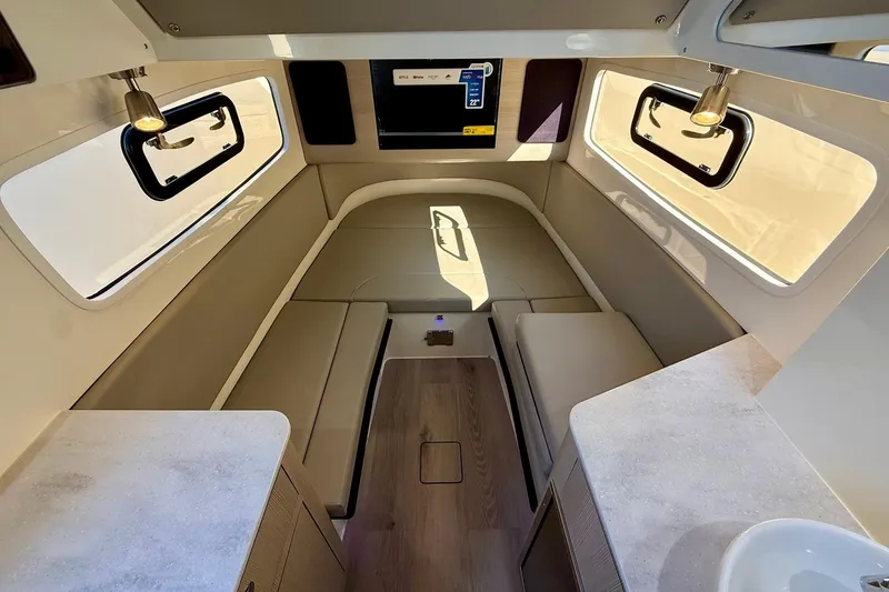 Slide: The Image of Luxurious interior of 2026 Scout 357 LXF boat with modern seating and lighting. - 16