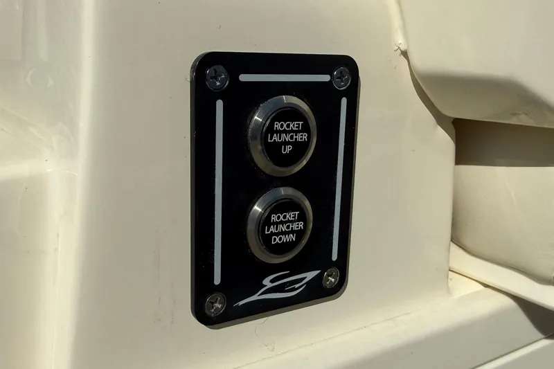 Slide: The Image of Control panel on 2026 Scout 357 LXF boat with rocket launcher buttons. - 35