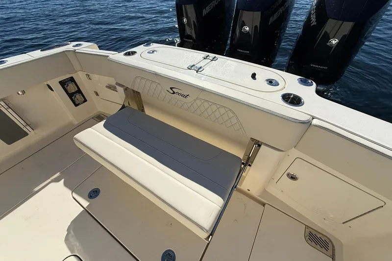 Slide: The Image of 2026 Scout 357 LXF boat interior with seating and Mercury Verado engines. - 37
