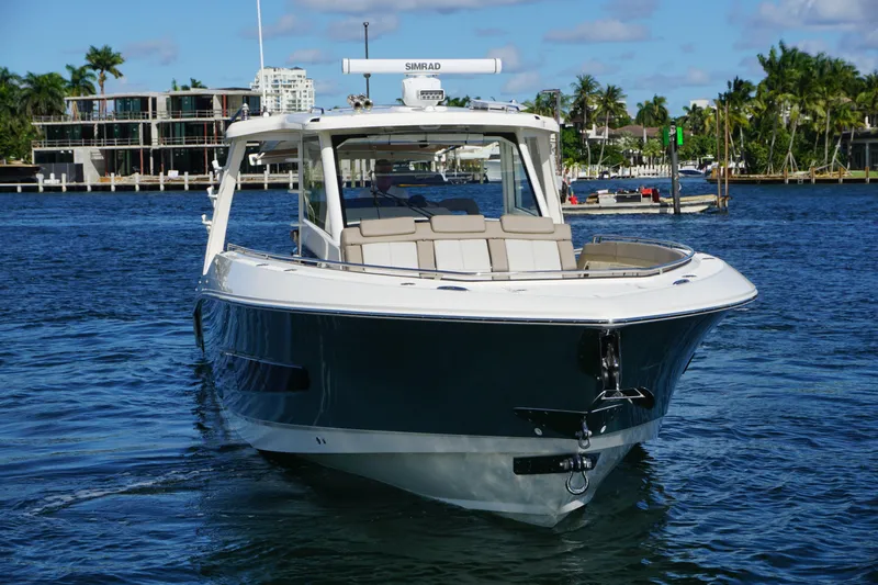 Slide: The Image of Luxurious interior of 2026 Boston Whaler 420 Outrage with modern amenities and seating. - 23