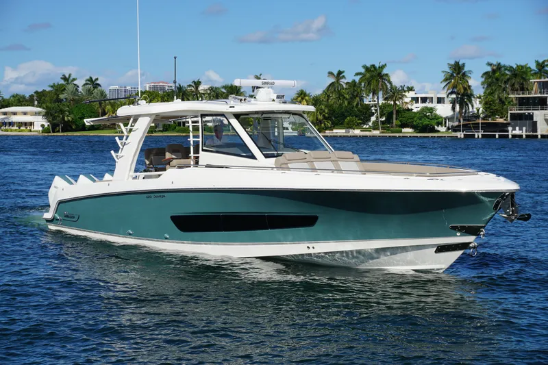 Slide: The Image of Luxurious bathroom interior of 2026 Boston Whaler 420 Outrage boat, featuring modern fixtures. - 24