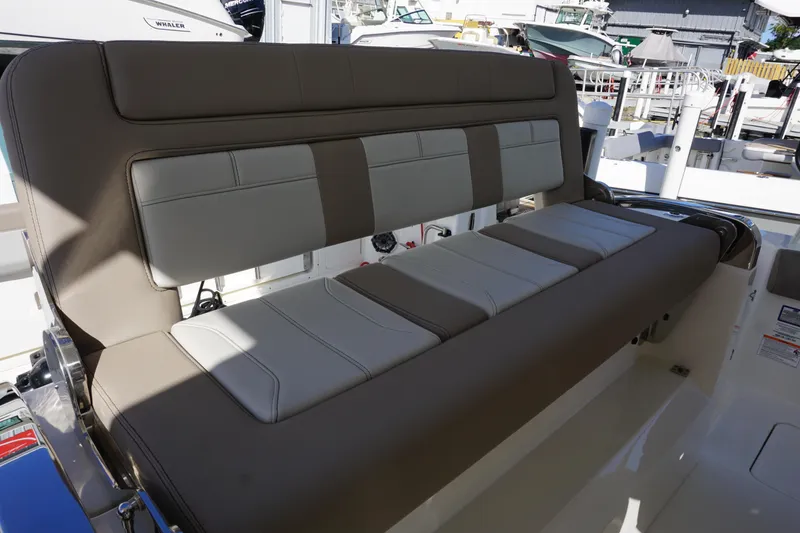 Slide: The Image of 2026 Boston Whaler 420 Outrage boat interior with seating and deck details. - 39