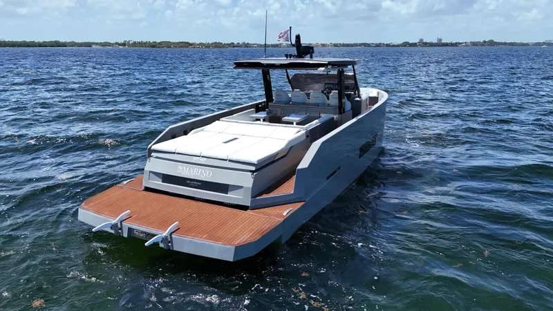 Slide: The Image of 2021 De Antonio Yachts D42 cruising on open water, showcasing sleek design and luxury features. - 10