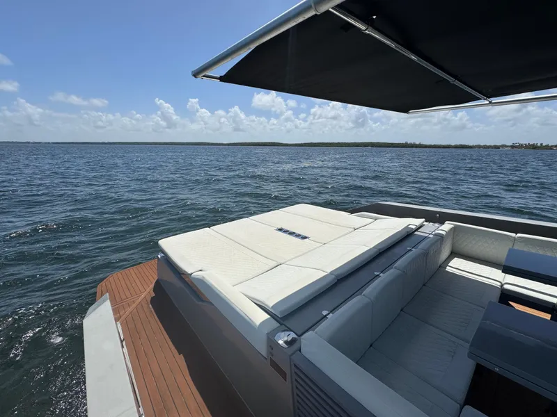 Slide: The Image of Luxurious 2021 De Antonio Yachts D42 with sunbed and canopy on open water. - 21