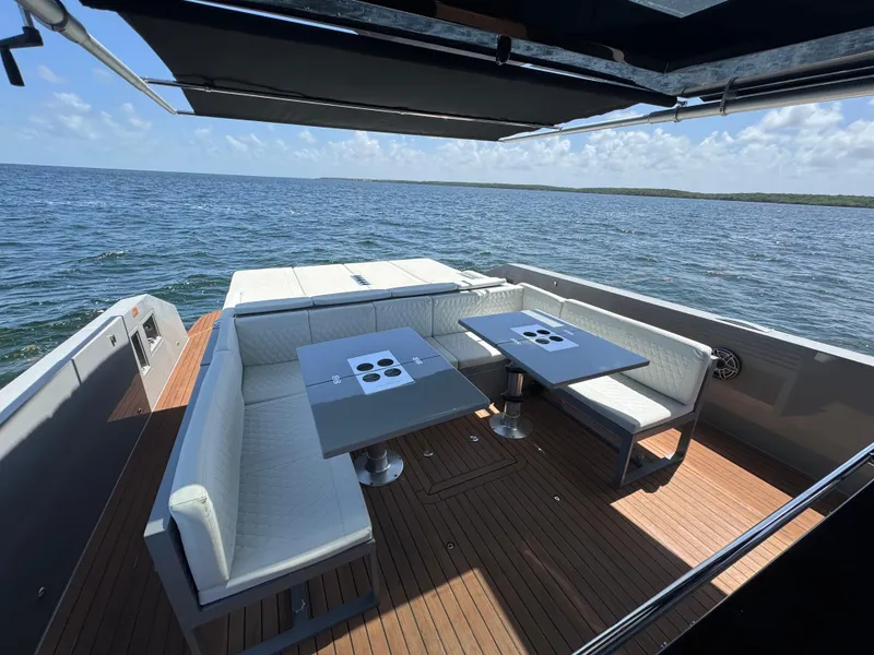 Slide: The Image of Luxurious 2021 De Antonio Yachts D42 with elegant seating and ocean view. - 25