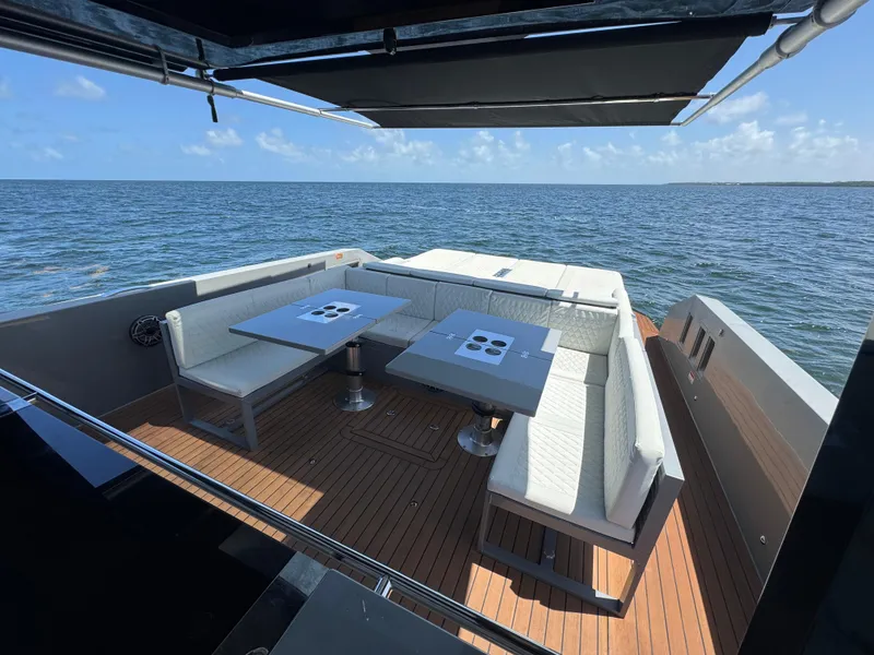 Slide: The Image of Luxury seating area on 2021 De Antonio Yachts D42, overlooking the ocean. - 26