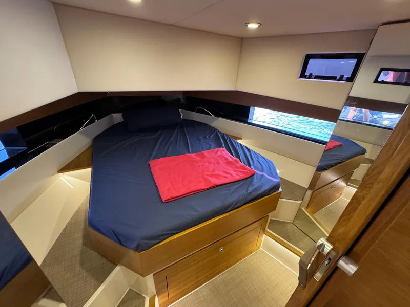Slide: The Image of Luxurious cabin interior of 2021 De Antonio Yachts D42 with cozy bed and modern design. - 35