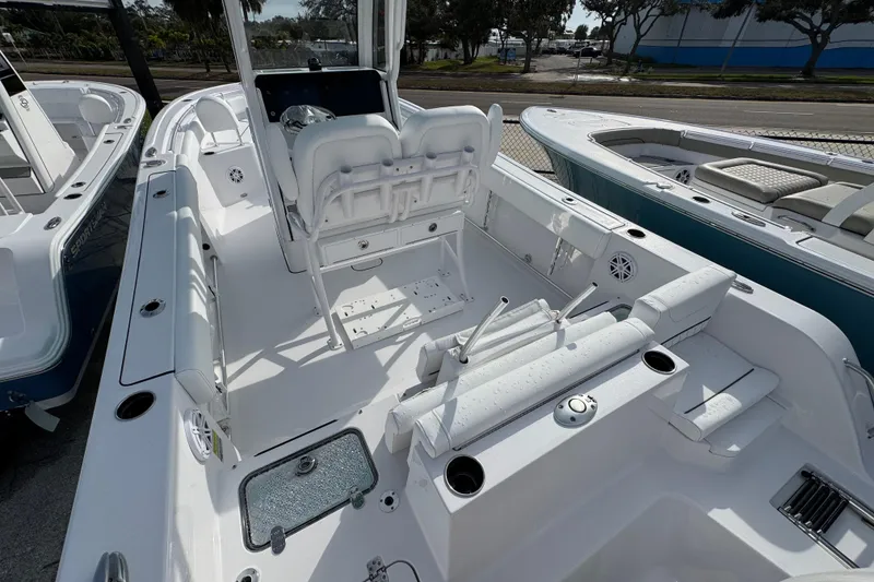 Slide: The Image of 2026 Sportsman Heritage 231 Center Console boat interior with seating and storage features. - 5