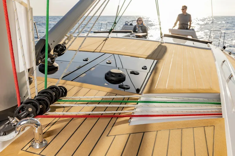 Slide: The Image of 2023 Hanse 460 yacht deck with colorful ropes and ocean view. - 11