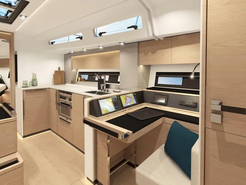 Slide: The Image of Modern interior of 2023 Hanse 460 yacht with sleek kitchen and navigation area. - 24