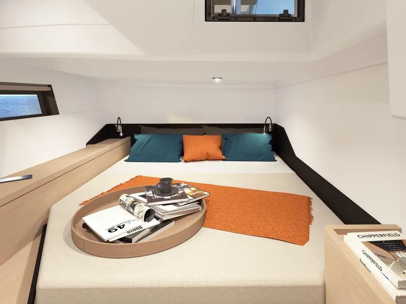 Slide: The Image of Luxurious cabin interior of 2023 Hanse 460 yacht with cozy bedding and modern decor. - 30
