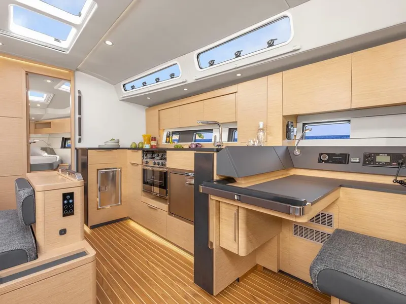 Slide: The Image of Modern interior of 2023 Hanse 460 yacht with sleek kitchen and seating area. - 32
