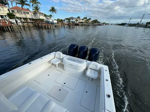 Slide: The Image of 2015 Invincible 39 Open Fisherman cruising on a scenic waterway. - 20