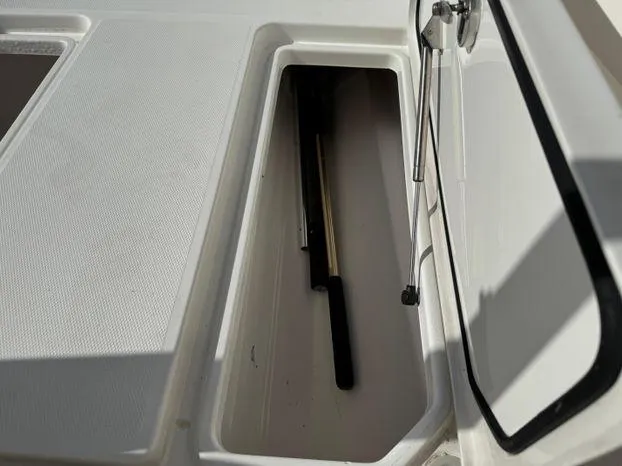Slide: The Image of Storage compartment on a 2015 Invincible 39 Open Fisherman boat. - 27
