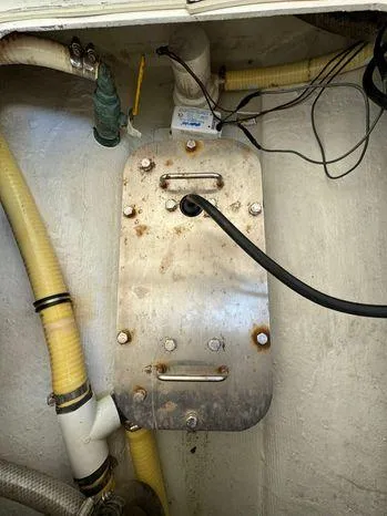 Slide: The Image of Bilge area of 2015 Invincible 39 Open Fisherman with hoses and wiring. - 37