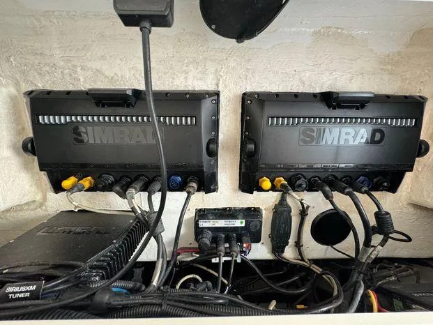 Slide: The Image of Simrad marine electronics setup on 2015 Invincible 39 Open Fisherman boat. - 39