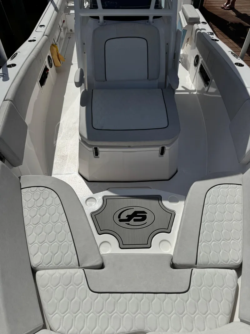 Slide: The Image of 2023 Sea Fox 268 Commander boat interior with cushioned seating and sleek design. - 8