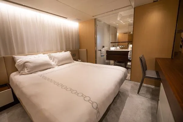 Slide: The Image of Luxurious bedroom interior on 2017 Sanlorenzo SL106 yacht, featuring elegant design and modern amenities. - 18