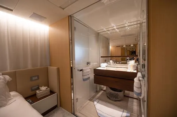 Slide: The Image of Luxurious bathroom interior of 2017 Sanlorenzo SL106 yacht, featuring modern design and elegant fixtures. - 19