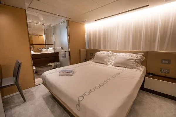 Slide: The Image of Luxurious bedroom interior on 2017 Sanlorenzo SL106 yacht, featuring elegant design and modern amenities. - 20