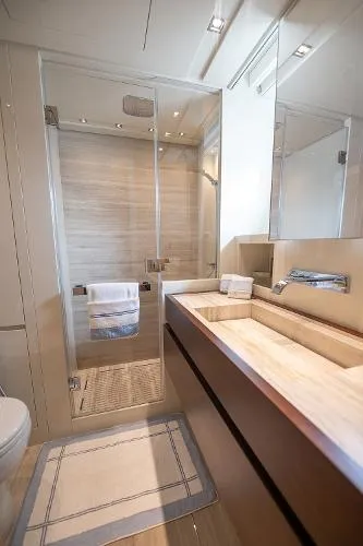 Slide: The Image of Luxurious bathroom on 2017 Sanlorenzo SL106 yacht with modern shower and sleek vanity. - 24