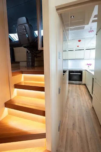 Slide: The Image of Interior of 2017 Sanlorenzo SL106 yacht with illuminated stairs and modern kitchen. - 27