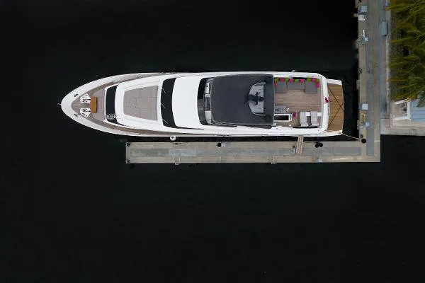 Slide: The Image of Overhead view of a 2017 Sanlorenzo SL106 yacht docked at a marina. - 36